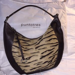 Puntotres brown leather tiger print calf hair bag